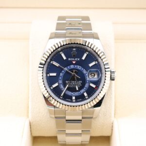 Blue dial luxury wristwatch on metal bracelet