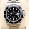 Black dial Submariner style watch on metal bracelet